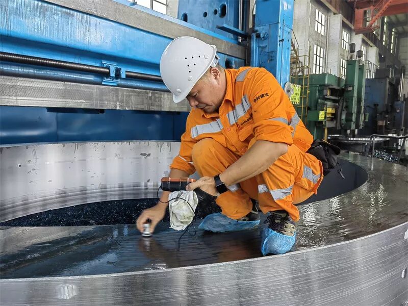 Customer inspecting a finish-machined ring casting